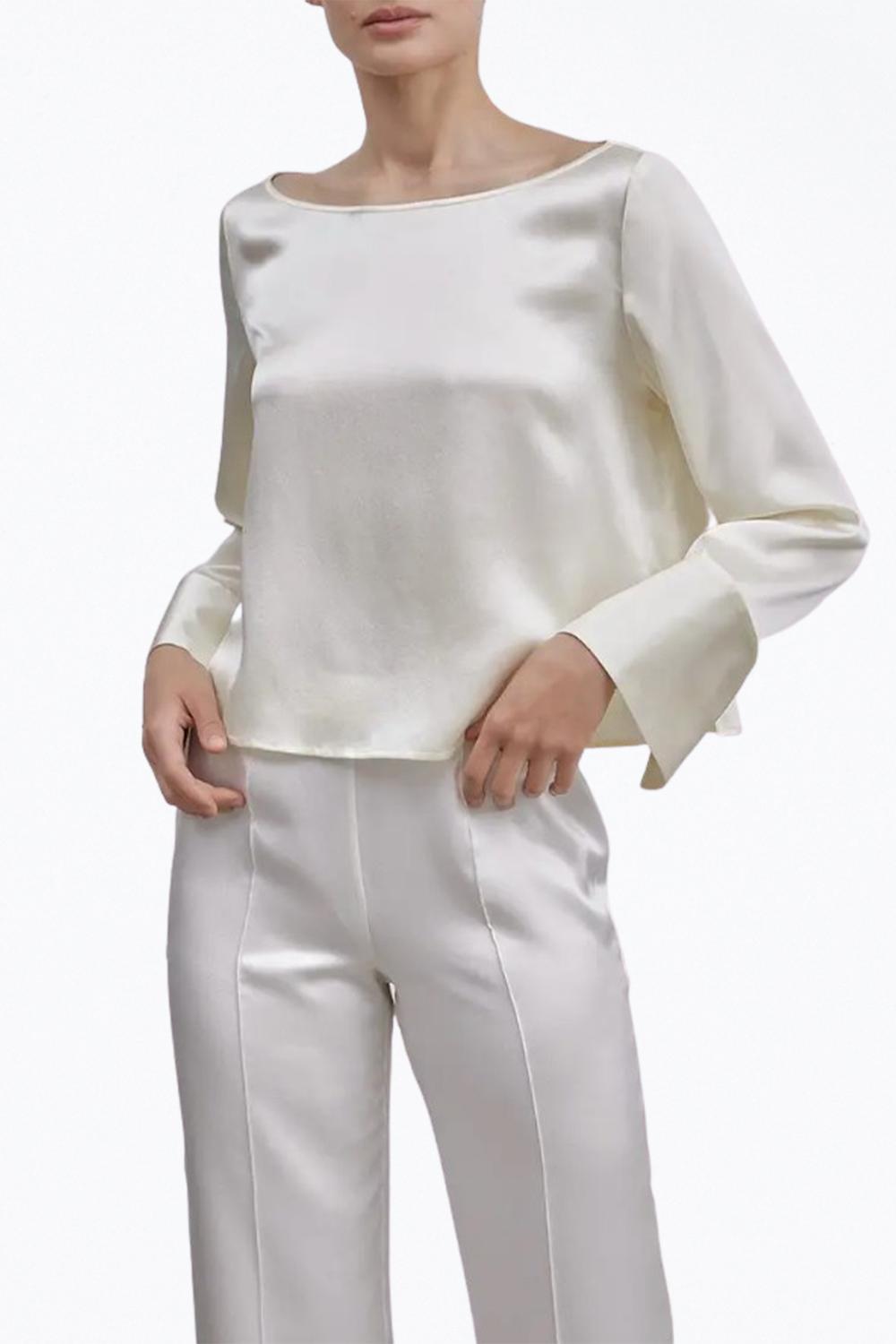 Шелковый топ с разрезами на манжетах цвета слоновой кости nap
Шелковый топ с разрезами на манжетах цвета слоновой кости nap