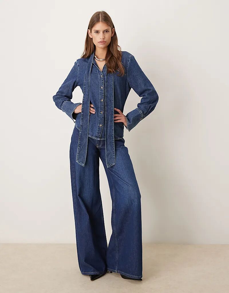 Рубашка из 100% хлопкового денима Msngo синего цвета с завязкой на шее
Рубашка из 100% хлопкового денима Msngo синего цвета с завязкой на шее