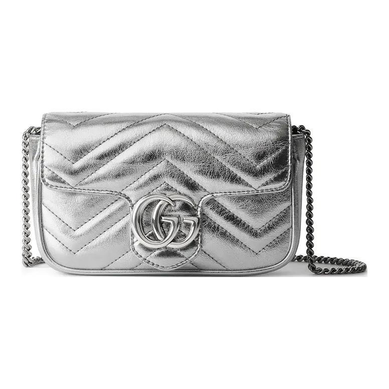 GUCCI Кожаная мини-сумка через плечо серебристого цвета
GUCCI Кожаная мини-сумка через плечо серебристого цвета