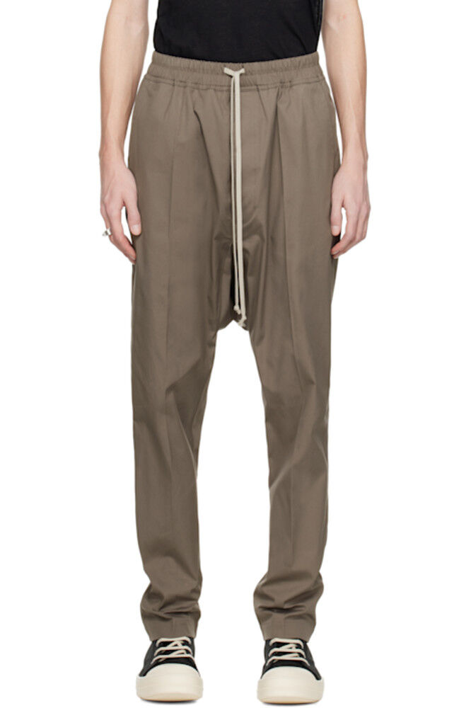 Серые длинные брюки Hollywood на завязках Rick Owens
Серые длинные брюки Hollywood на завязках Rick Owens