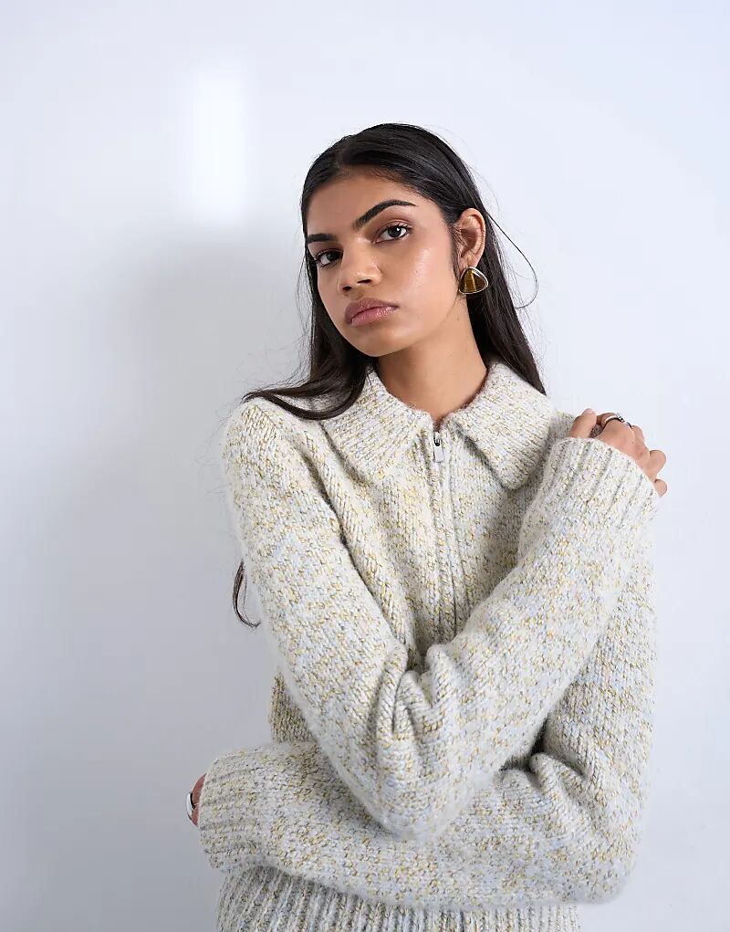 Кардиган Topshop из толстой пряжи в скрученном виде синего и желтого цветов
Кардиган Topshop из толстой пряжи в скрученном виде синего и желтого цветов