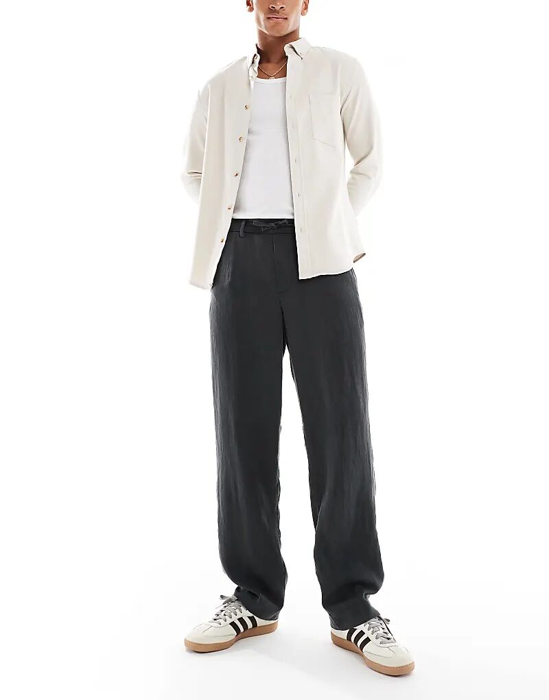 Легкие брюки Jack & Jones на завязках черного цвета
Легкие брюки Jack & Jones на завязках черного цвета