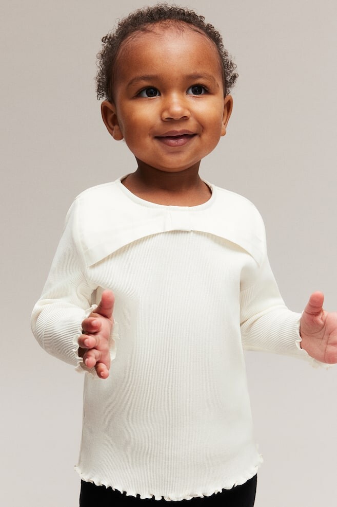 Рубашка из джерси с бантом H&M, белый
Рубашка из джерси с бантом H&M, белый