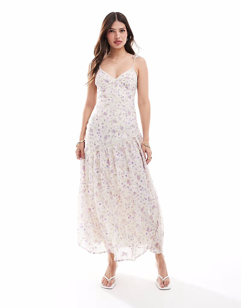 Платье миди с кружевными вставками и панелями ASOS DESIGN с сиреневым мелким цветочным принтом
Платье миди с кружевными вставками и панелями ASOS DESIGN с сиреневым мелким цветочным принтом