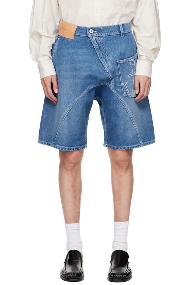 Jw Anderson Синие джинсовые шорты рабочей формы с перекрученными штанинами
Jw Anderson Синие джинсовые шорты рабочей формы с перекрученными штанинами