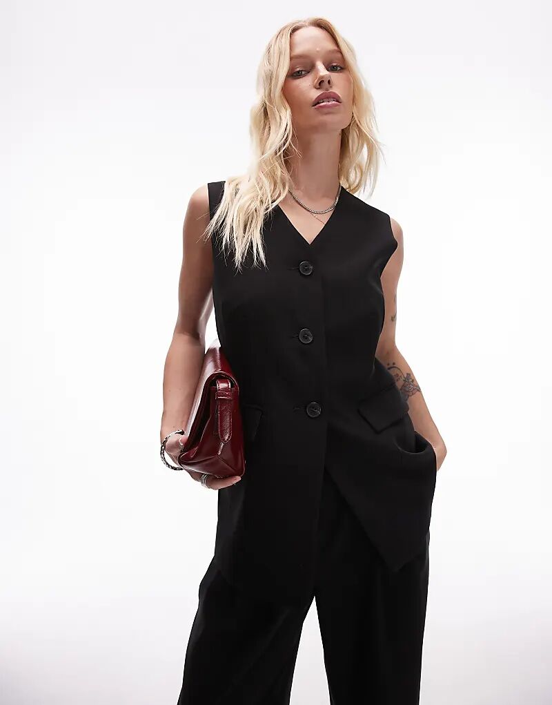 Удлиненный приталенный жилет Topshop черного цвета
Удлиненный приталенный жилет Topshop черного цвета