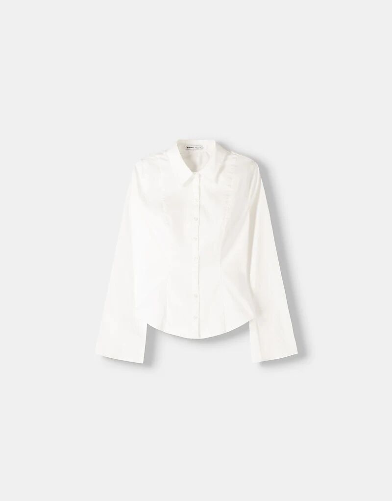 Рубашка Bershka приталенного кроя с расклешенными рукавами белого цвета
Рубашка Bershka приталенного кроя с расклешенными рукавами белого цвета