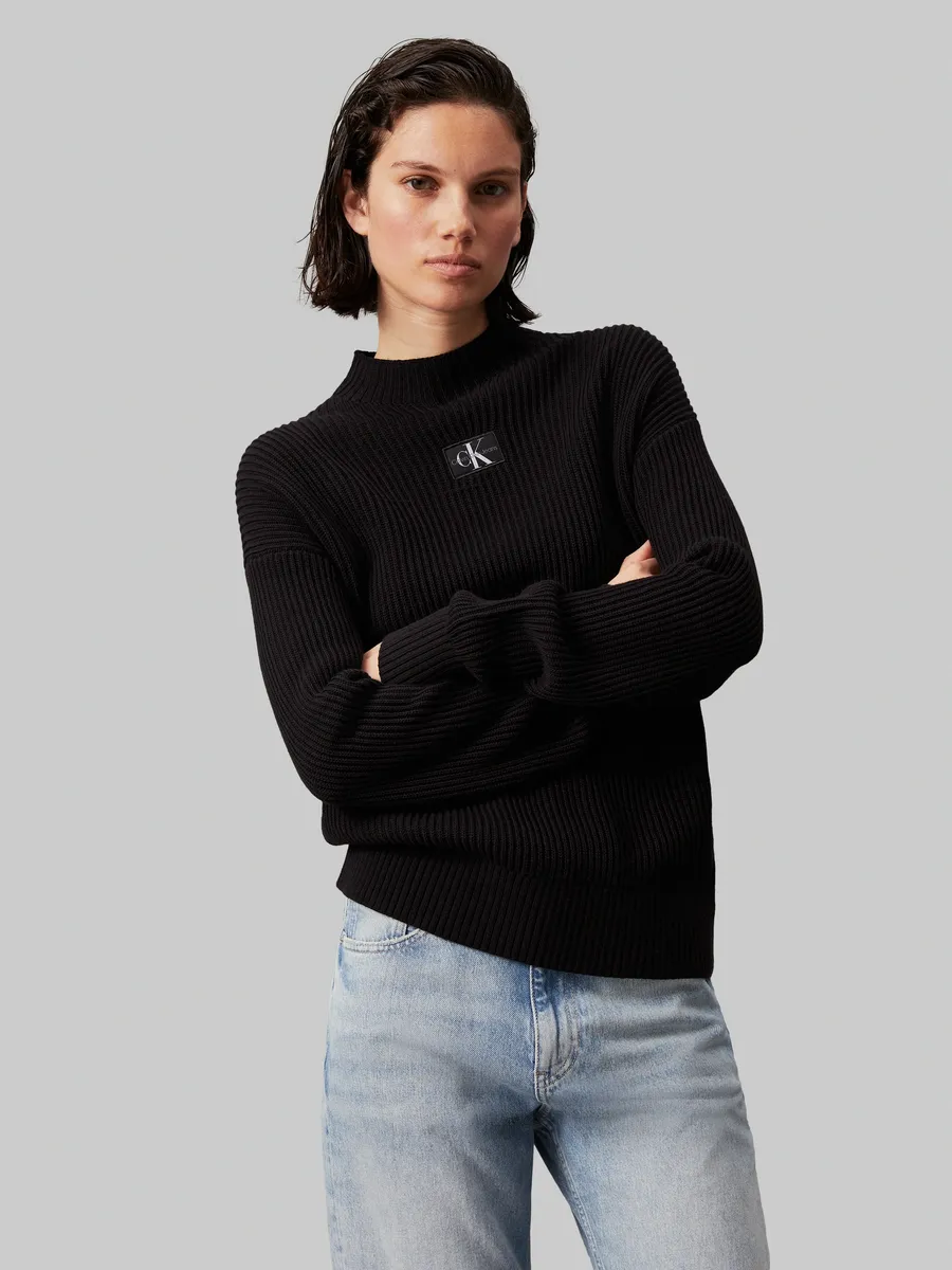 Свитер с воротником стойкой Calvin Klein Jeans "WOVEN LABEL LOOSE SWEATER" и нашивкой с логотипом, цвет Ck Black
Свитер с воротником стойкой Calvin Klein Jeans "WOVEN LABEL LOOSE SWEATER" и нашивкой с логотипом, цвет Ck Black