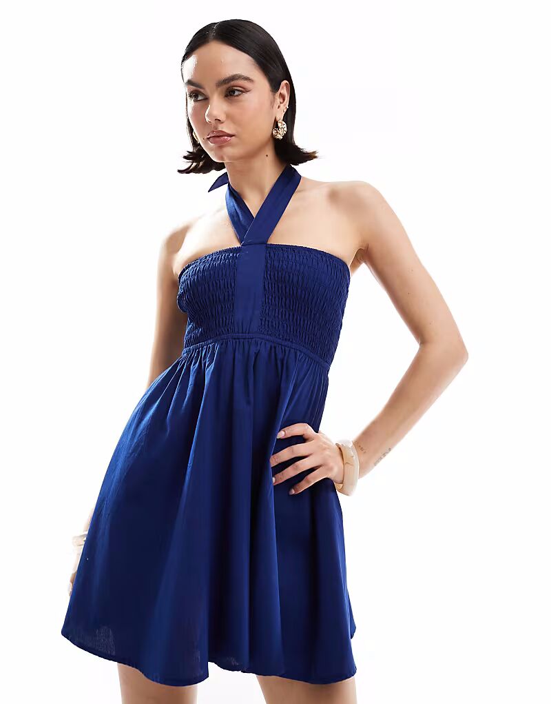 Эксклюзивное пляжное мини-платье Esmee с халтер-халтером и сборками в темно-синем цвете Esmée
Эксклюзивное пляжное мини-платье Esmee с халтер-халтером и сборками в темно-синем цвете Esmée