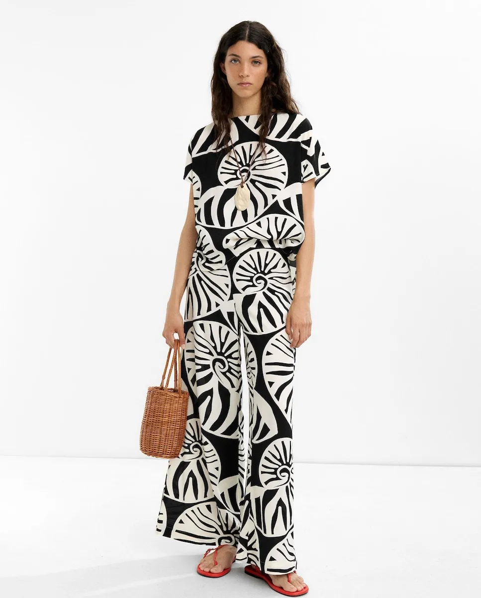 Женские свободные брюки из 100% вискозы с принтом ракушек Parfois, черный/белый
Женские свободные брюки из 100% вискозы с принтом ракушек Parfois, черный/белый