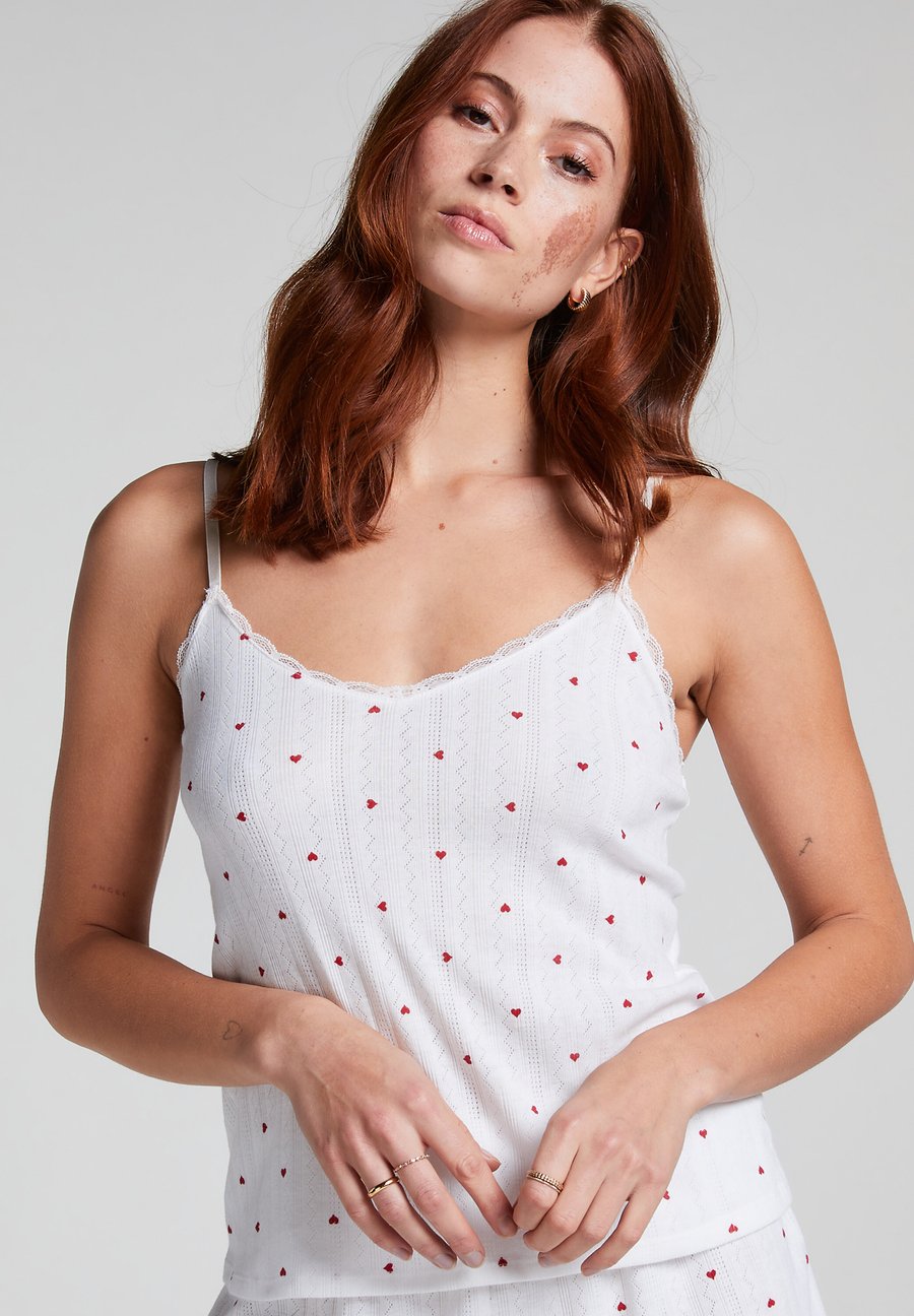 Пижамный топ Hunkemöller CAMI HEARTS, White
Пижамный топ Hunkemöller CAMI HEARTS, White