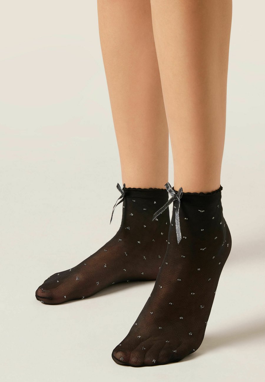 Носки Calzedonia 30 DENIER GLITTER AND BOWS, Black/Mottled Dark Grey
Носки Calzedonia 30 DENIER GLITTER AND BOWS, Black/Mottled Dark Grey