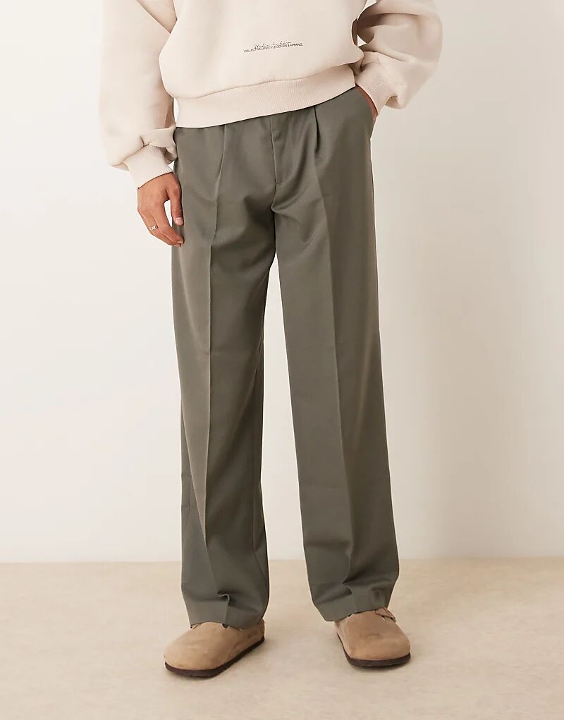 Элегантные широкие брюки со складкой спереди приглушенного зеленого цвета ASOS DESIGN
Элегантные широкие брюки со складкой спереди приглушенного зеленого цвета ASOS DESIGN