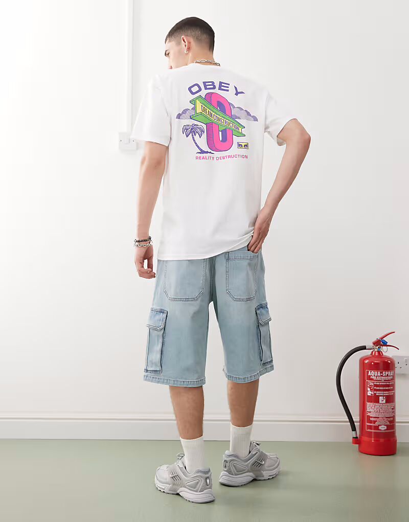 Obey - футболка белого цвета с логотипом «Dream Construction» на спине
Obey - футболка белого цвета с логотипом «Dream Construction» на спине