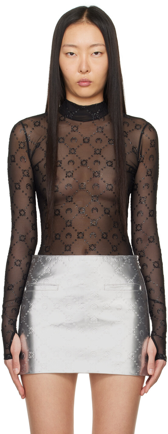 Черная футболка с длинным рукавом с флоковым принтом Marine Serre
Черная футболка с длинным рукавом с флоковым принтом Marine Serre