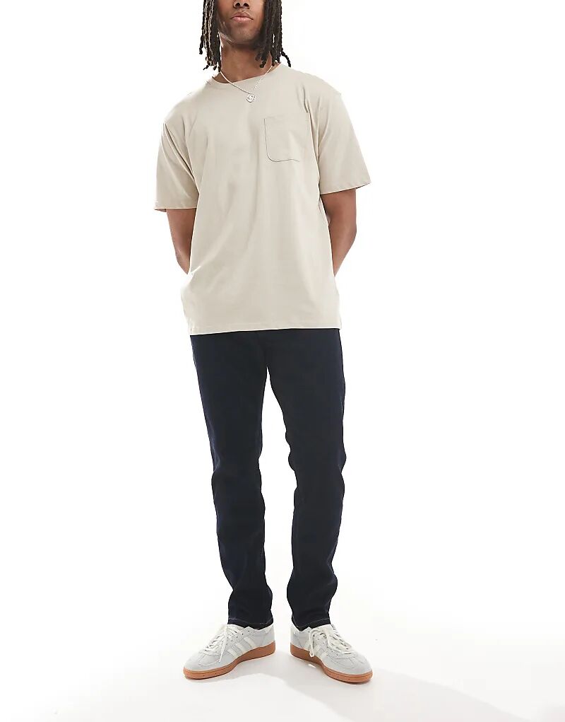 Джинсы Wrangler Larston зауженного кроя темно-синего цвета
Джинсы Wrangler Larston зауженного кроя темно-синего цвета