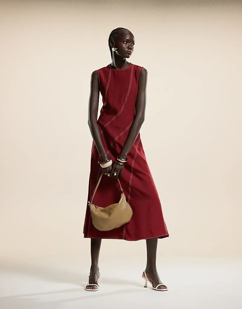 Платье midaxi с изогнутой контрастной строчкой в бордовом цвете Ghospell
Платье midaxi с изогнутой контрастной строчкой в бордовом цвете Ghospell