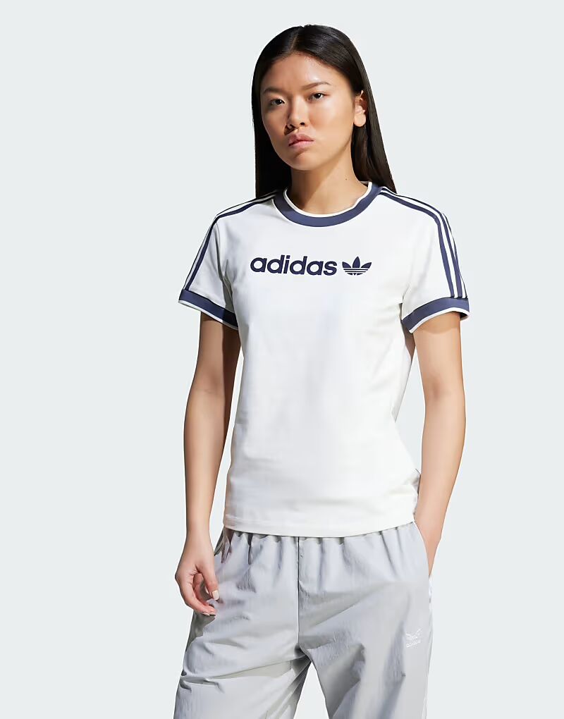 Футболка Adidas Originals Linear с тремя полосками в цвете «облачно-белый»
Футболка Adidas Originals Linear с тремя полосками в цвете «облачно-белый»