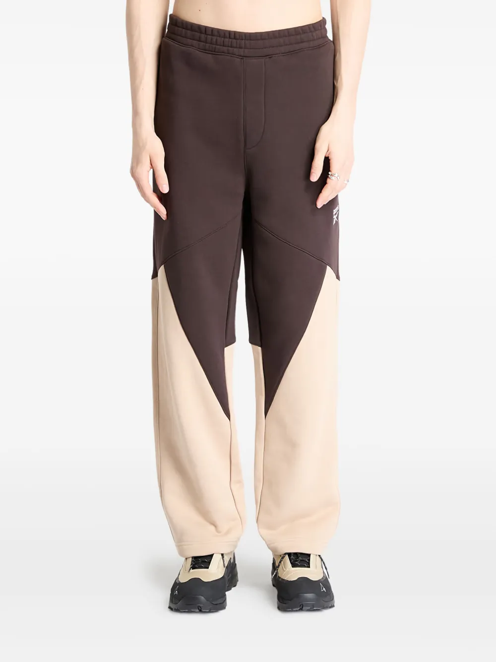 Широкие брюки Reebok, нейтральный
Широкие брюки Reebok, нейтральный