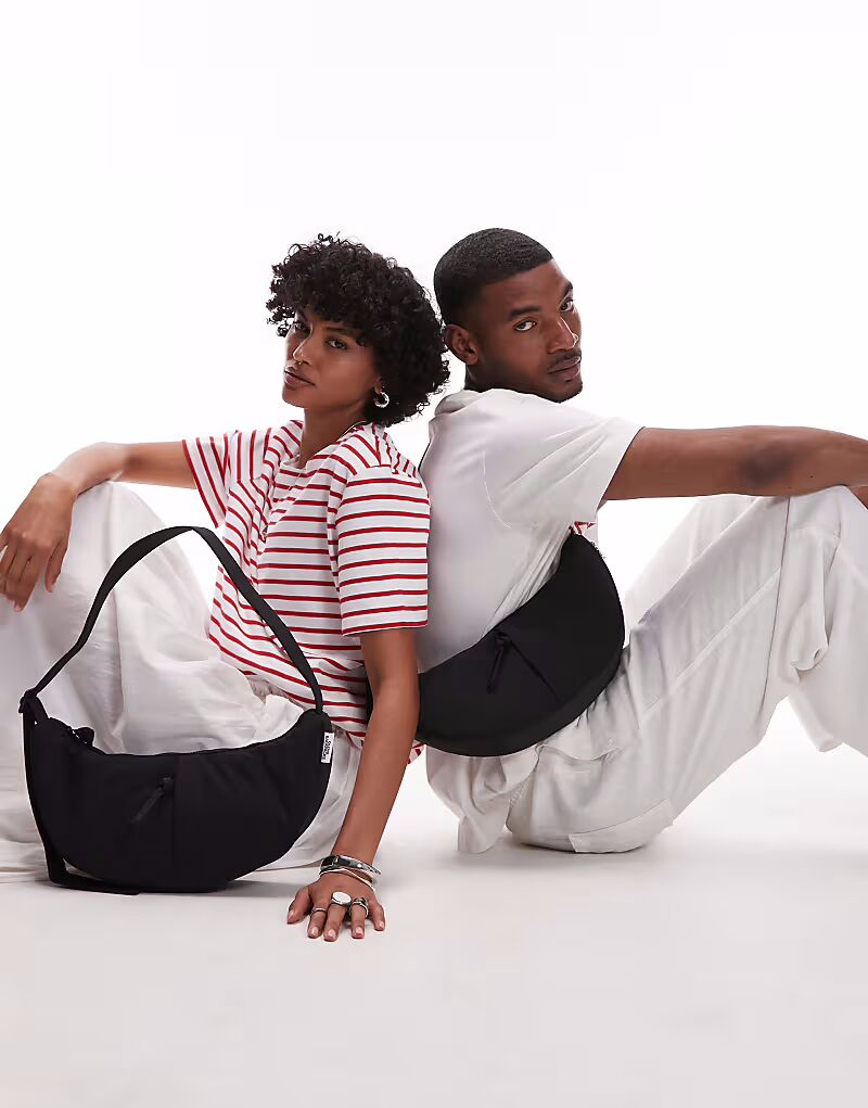 OLEND - Moon - Сумка через плечо из нейлона в форме полумесяца черного цвета
OLEND - Moon - Сумка через плечо из нейлона в форме полумесяца черного цвета