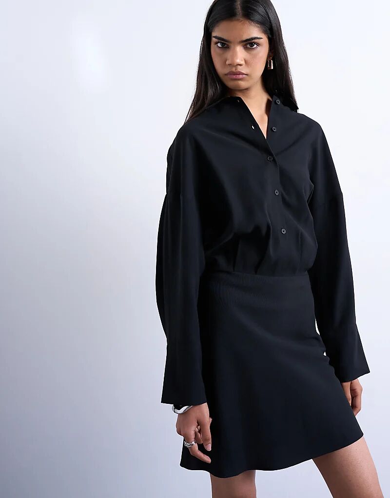 Платье-рубашка Topshop с приталенным краем, микро-мини, из черного купро
Платье-рубашка Topshop с приталенным краем, микро-мини, из черного купро
