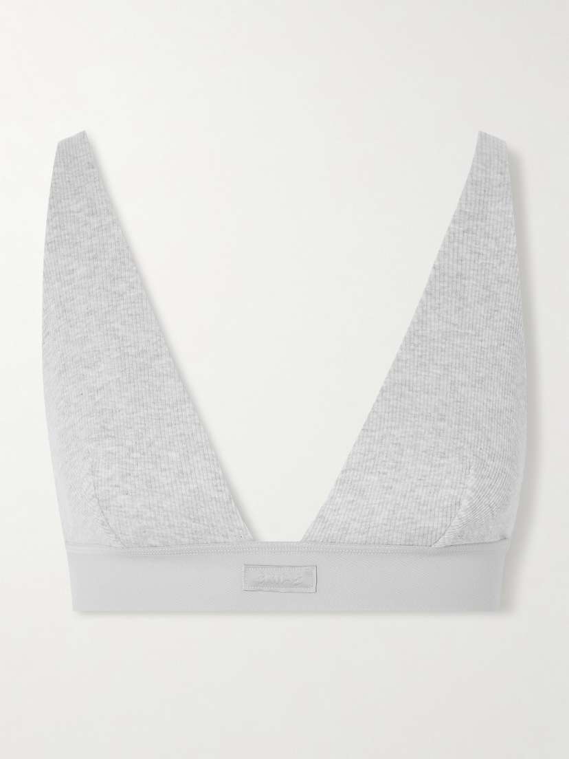 Бюстгальтер-Бралетт с глубоким вырезом из эластичного хлопка в рубчик - светло-серый меланж Skims, серый
Бюстгальтер-Бралетт с глубоким вырезом из эластичного хлопка в рубчик - светло-серый меланж Skims, серый