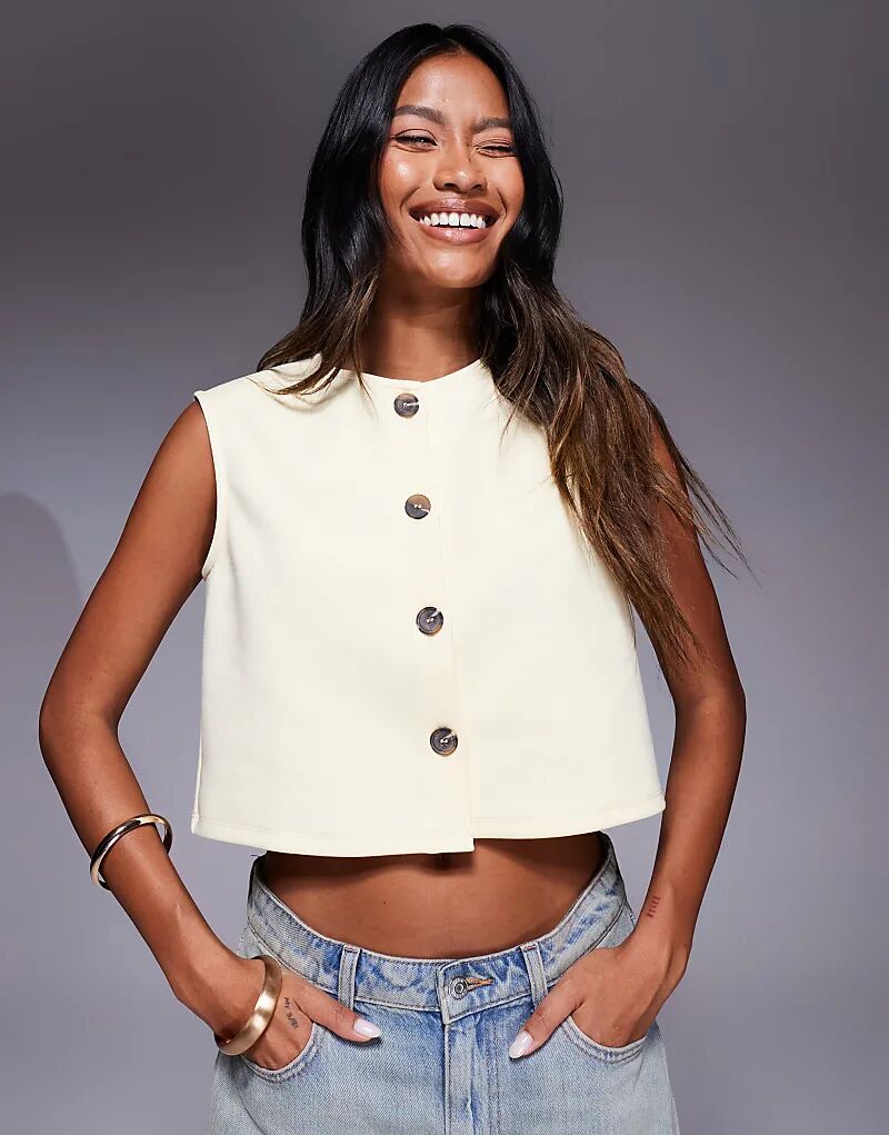 Укороченный жилет свободного кроя с широкими плечами ASOS DESIGN цвета пахты и молока
Укороченный жилет свободного кроя с широкими плечами ASOS DESIGN цвета пахты и молока