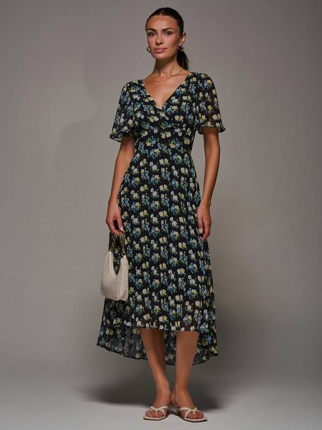 Шифоновое миди-платье с коротким рукавом и цветочным принтом Jolie Moi
Шифоновое миди-платье с коротким рукавом и цветочным принтом Jolie Moi