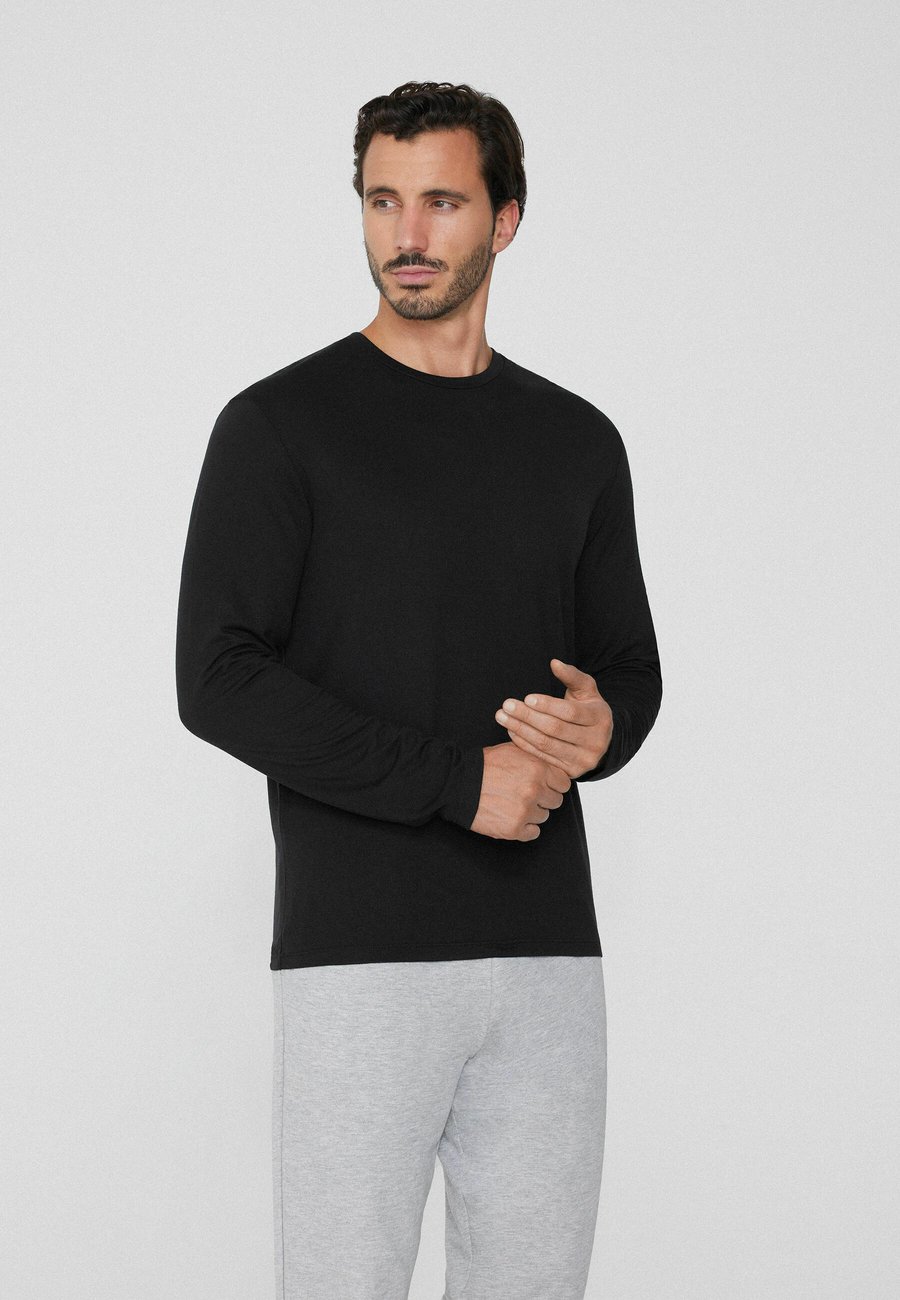 Топ Tezenis Long sleeved top, Black
Топ Tezenis Long sleeved top, Black