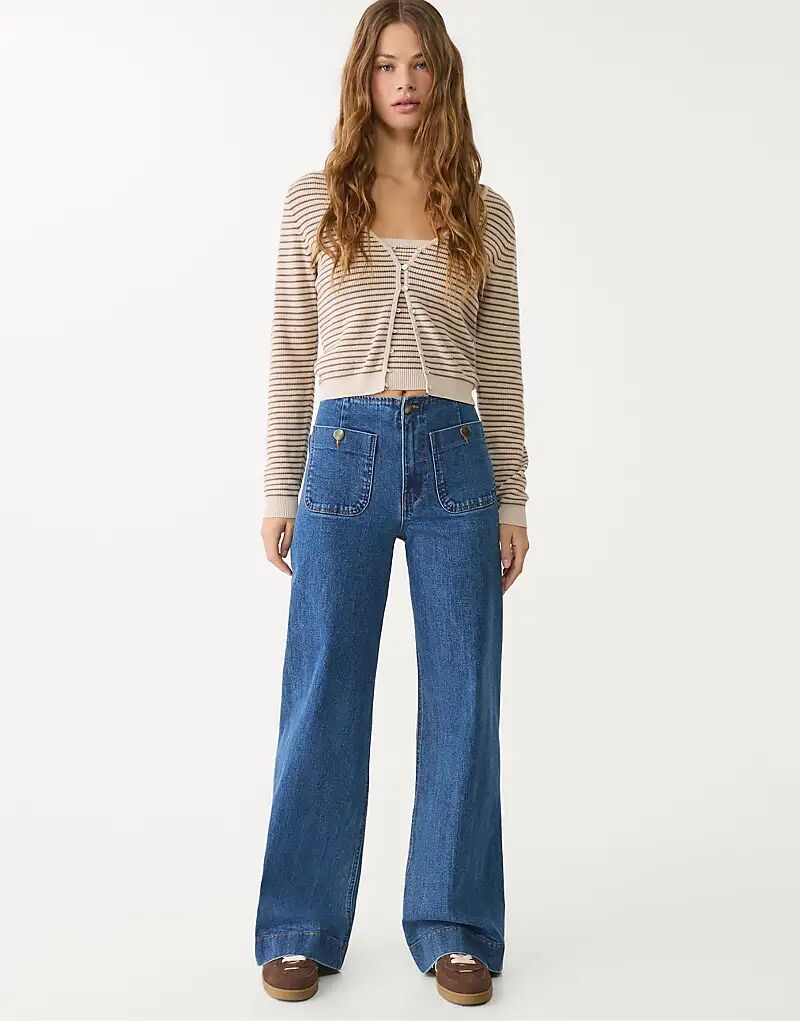 Джинсы Stradivarius Petite d77 в минималистичном стиле с карманами насыщенного синего цвета
Джинсы Stradivarius Petite d77 в минималистичном стиле с карманами насыщенного синего цвета