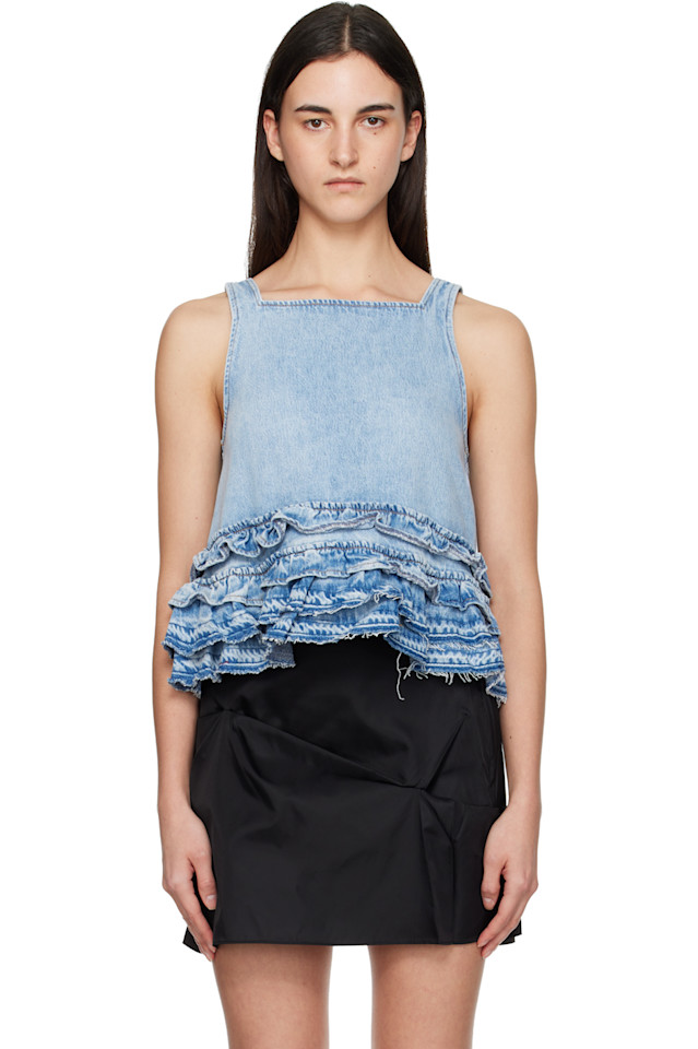 Ganni Джинсовая майка с оборками синего цвета
Ganni Джинсовая майка с оборками синего цвета