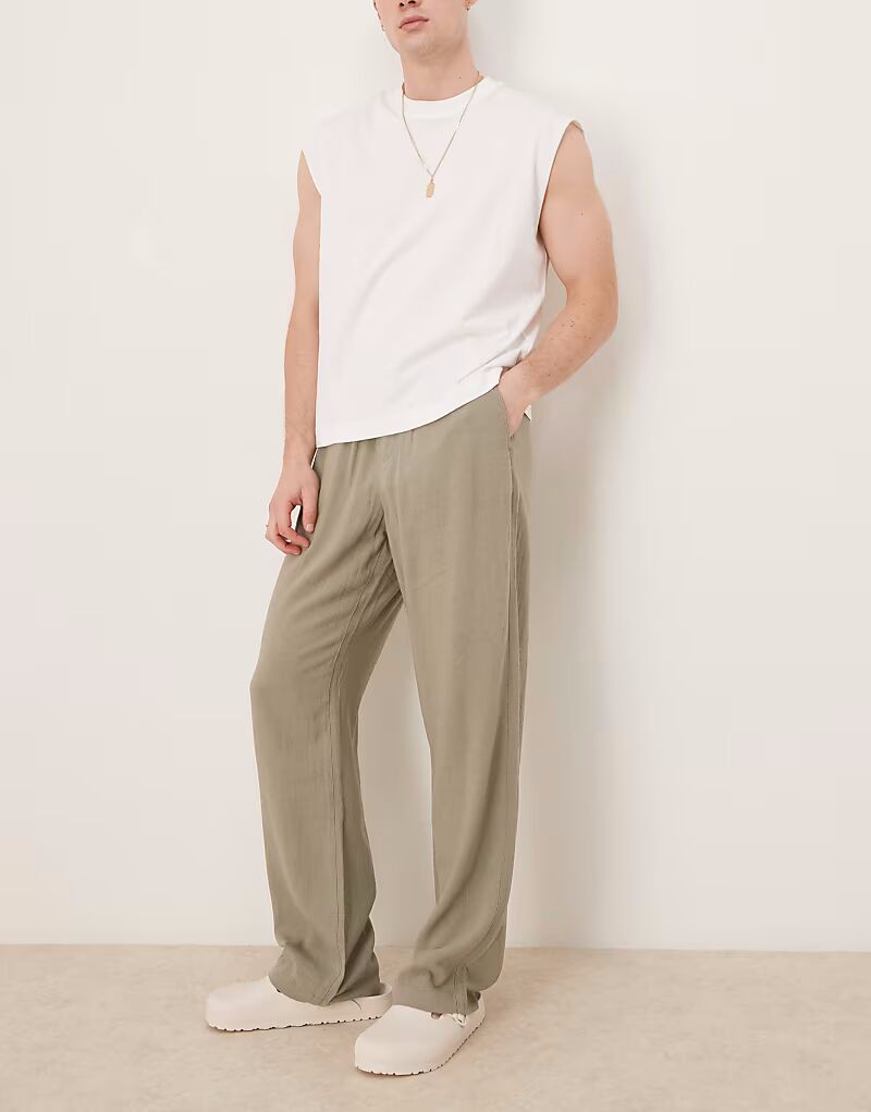 Брюки свободного кроя ASOS DESIGN из льна цвета хаки с застежкой-молнией
Брюки свободного кроя ASOS DESIGN из льна цвета хаки с застежкой-молнией