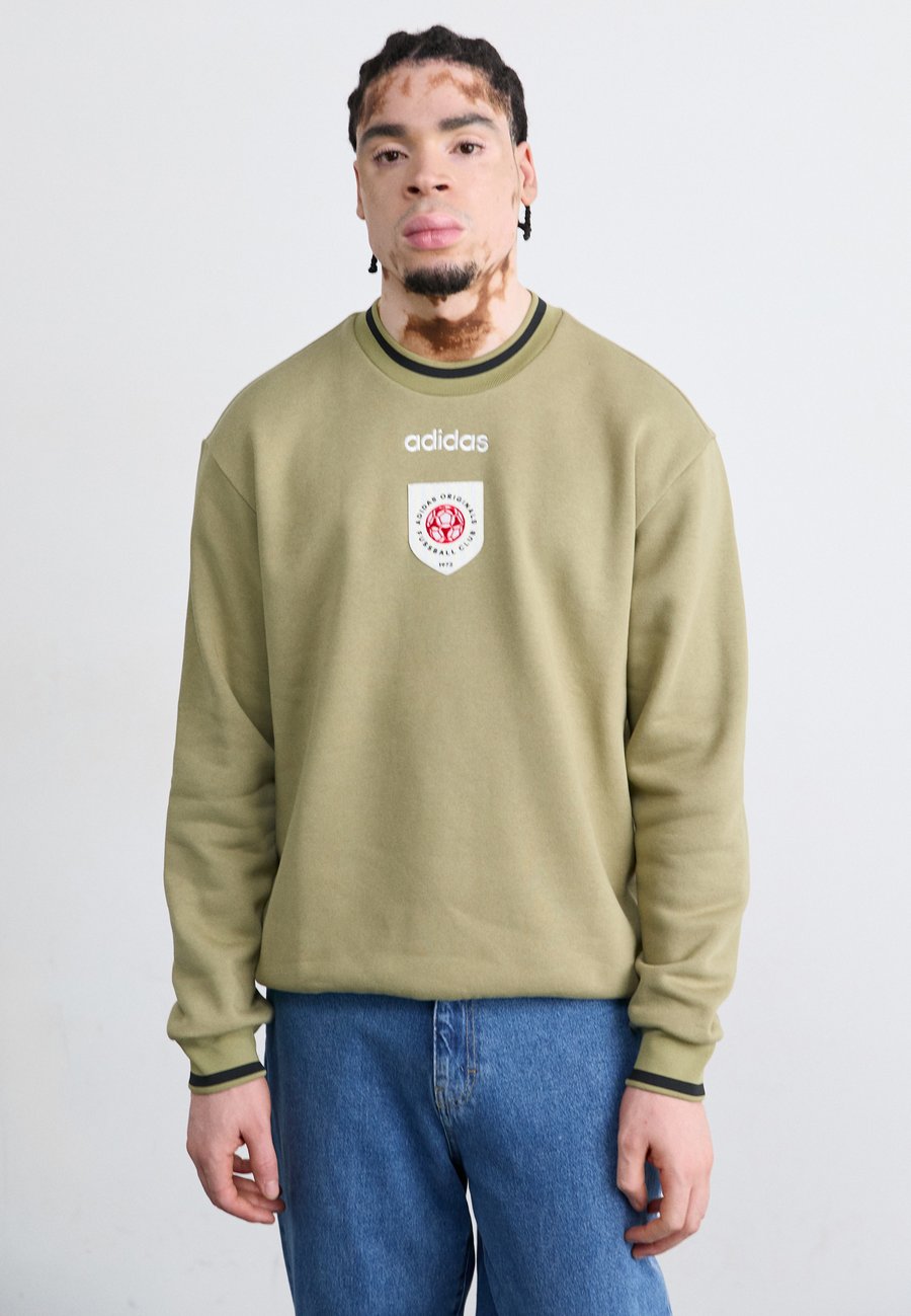 Толстовка Adidas Originals CREWNECK , Orbit Green/Dark Grey
Толстовка Adidas Originals CREWNECK , Orbit Green/Dark Grey