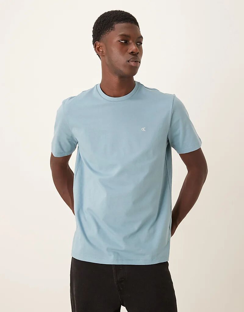 Футболка с маленьким логотипом Calvin Klein Jeans темно-синего цвета
Футболка с маленьким логотипом Calvin Klein Jeans темно-синего цвета