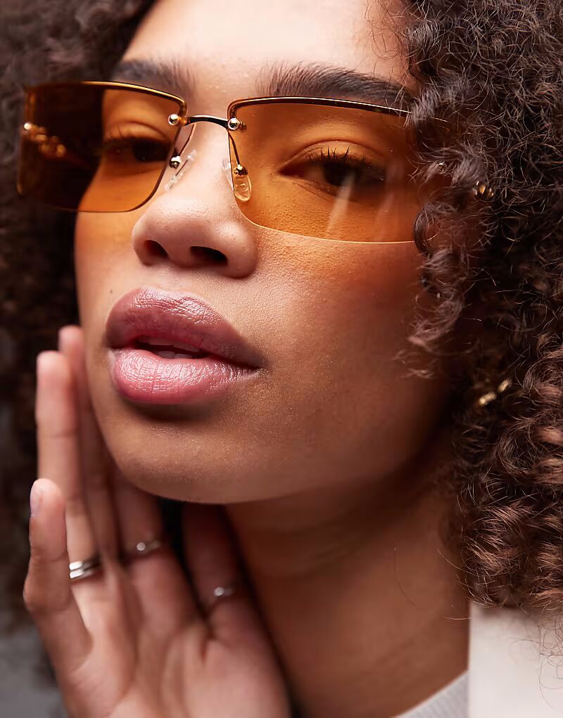 Солнцезащитные очки без оправы Le Specs Alien Square в янтарном и золотом цвете
Солнцезащитные очки без оправы Le Specs Alien Square в янтарном и золотом цвете