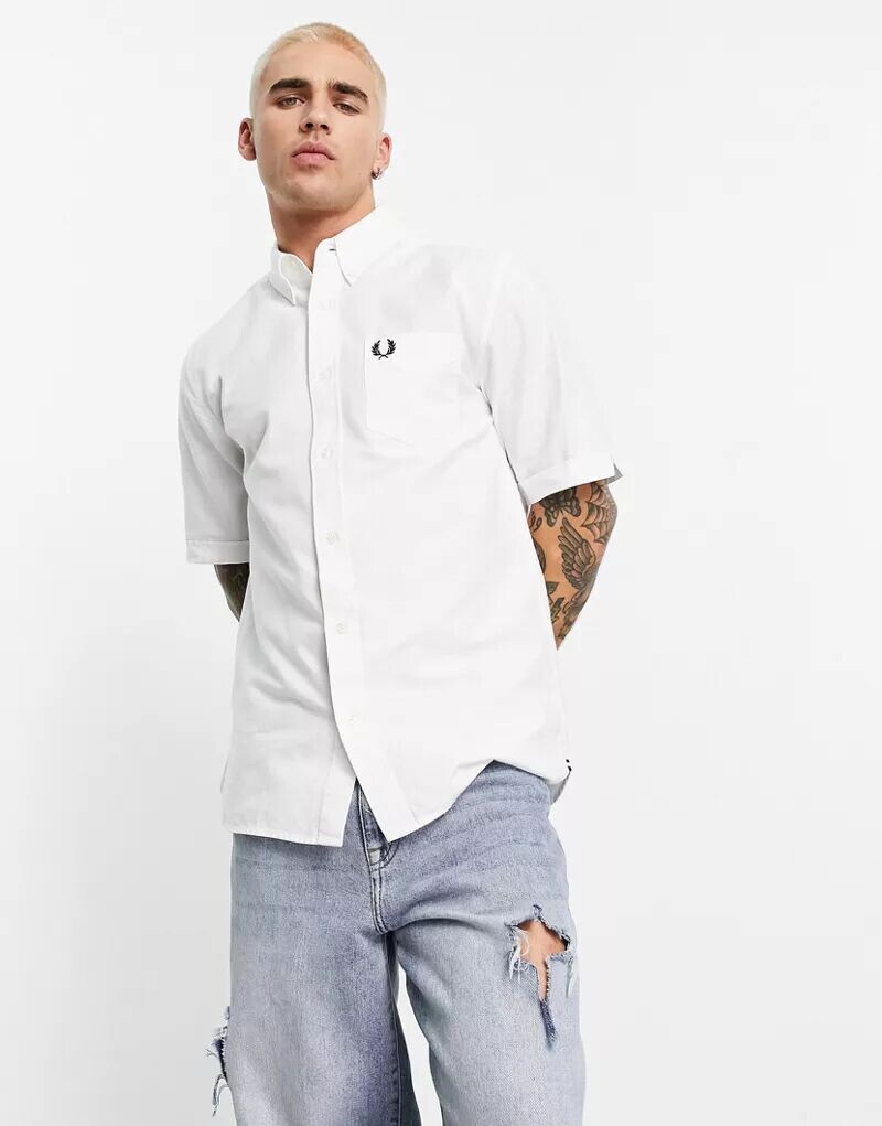 Белая оксфордская рубашка с короткими рукавами Fred Perry
Белая оксфордская рубашка с короткими рукавами Fred Perry