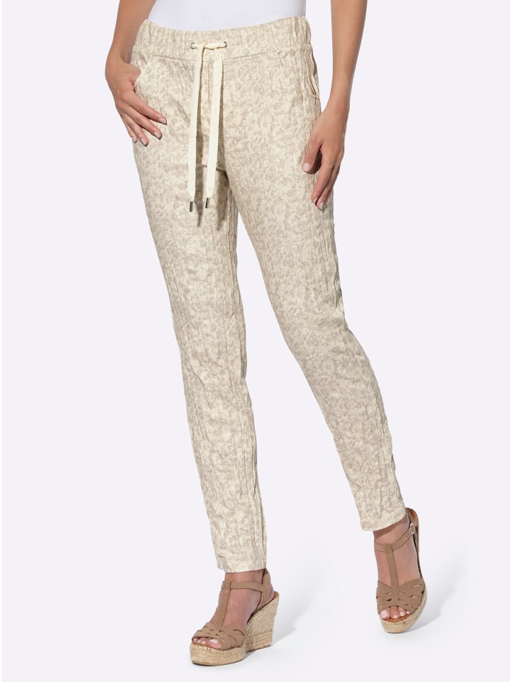 Брюки с принтом цвета шампанского и бежевого Heine
Брюки с принтом цвета шампанского и бежевого Heine