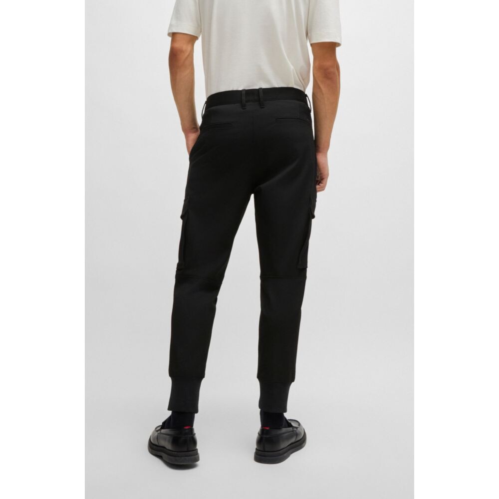 Брюки узкого кроя из эластичного габардина. Hugo, черный
Брюки узкого кроя из эластичного габардина. Hugo, черный