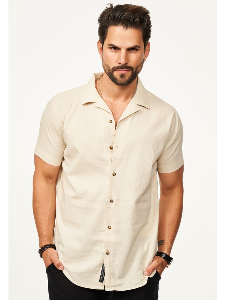 Летняя льняная рубашка с короткими рукавами, прямого кроя, бежевого цвета. behype
Летняя льняная рубашка с короткими рукавами, прямого кроя, бежевого цвета. behype