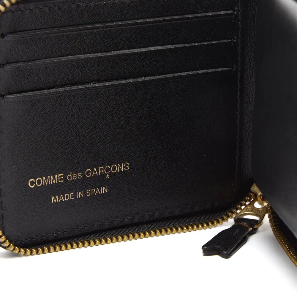 Comme des Garçons Чечевицеобразный кошелек в клетку тартан, зеленый
Comme des Garçons Чечевицеобразный кошелек в клетку тартан, зеленый