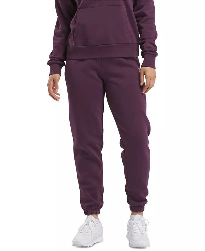 Женские флисовые спортивные штаны Jogger с металлическим логотипом Reebok, фиолетовый
Женские флисовые спортивные штаны Jogger с металлическим логотипом Reebok, фиолетовый