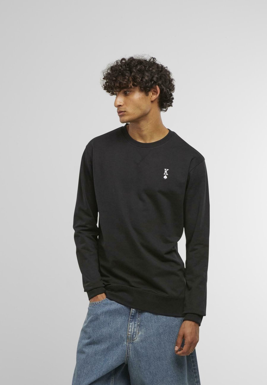 Толстовка Mister Tee KING SIGN EMB LIGHT CREW, Black
Толстовка Mister Tee KING SIGN EMB LIGHT CREW, Black