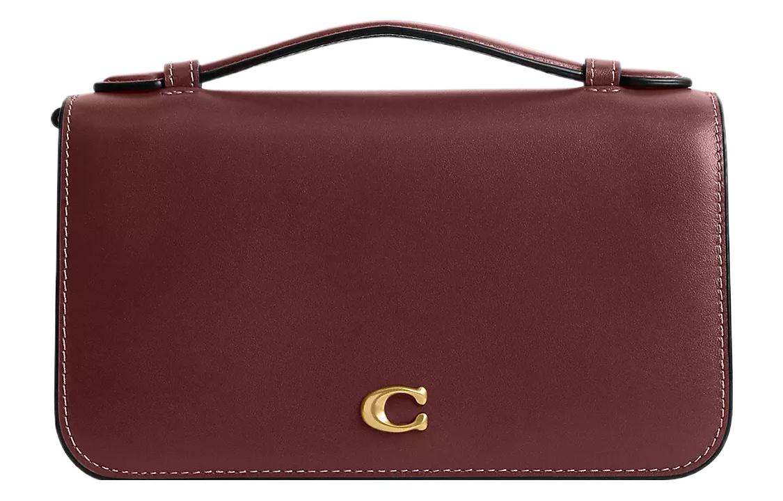 Коуч Сумка через плечо из телячьей кожи малая женская с латунной фурнитурой и бордовым оттенком
Коуч Сумка через плечо из телячьей кожи малая женская с латунной фурнитурой и бордовым оттенком