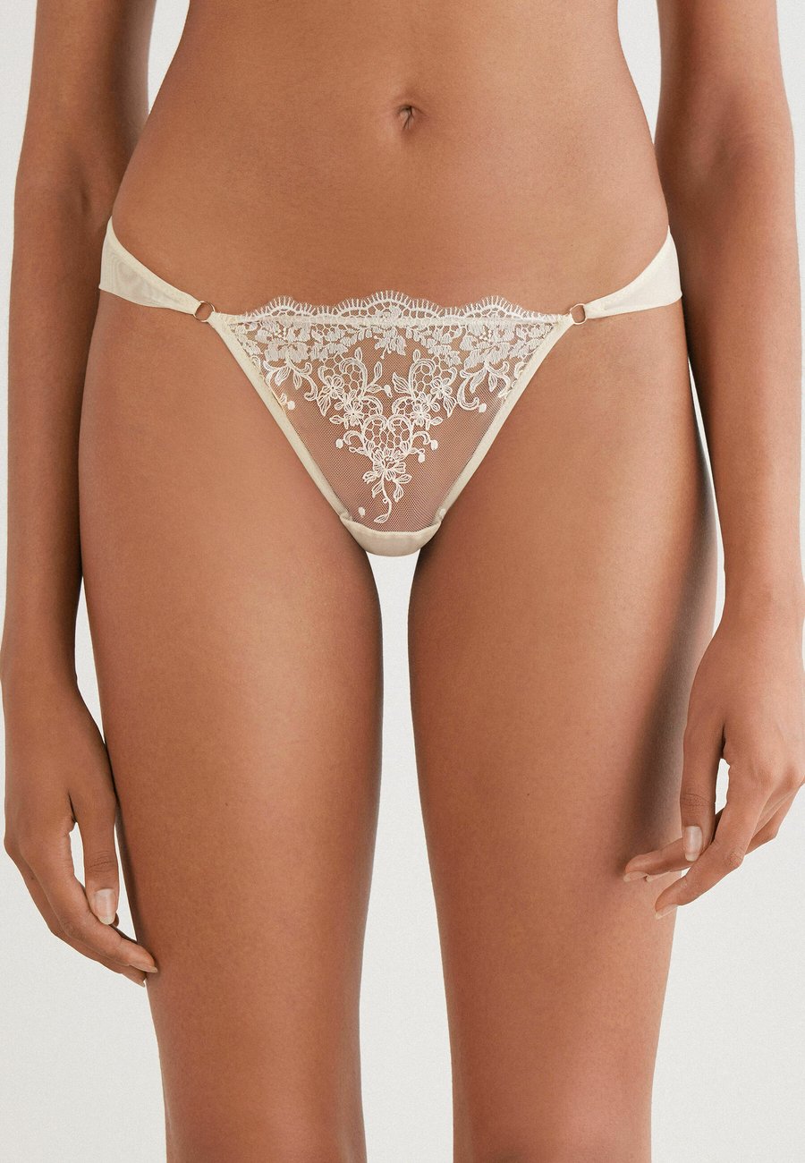 Трусы Intimissimi Thong, Natural/Beige
Трусы Intimissimi Thong, Natural/Beige
