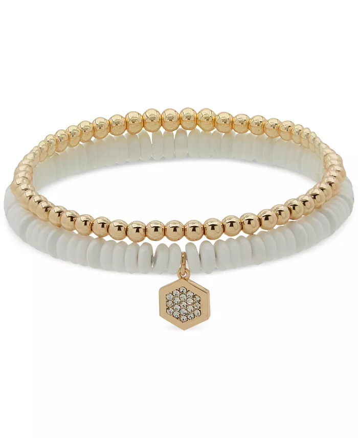 Комплект из двух эластичных браслетов с шестиугольными бусинами и подвесками-паве золотистого оттенка DKNY, белый
Комплект из двух эластичных браслетов с шестиугольными бусинами и подвесками-паве золотистого оттенка DKNY, белый