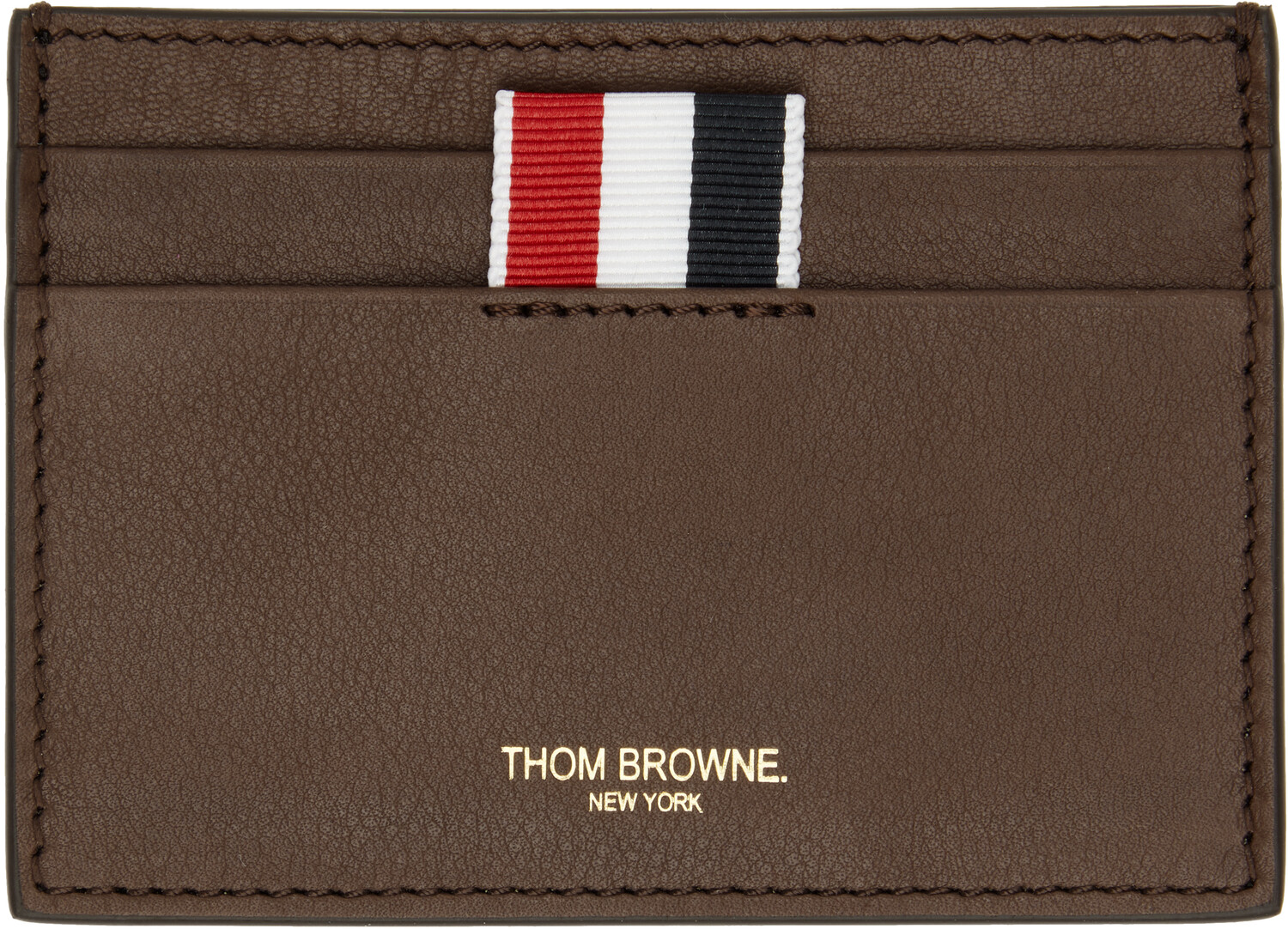 Коричневая мягкая телячья кожа держатель для одной карты Thom Browne, темно-коричневый
Коричневая мягкая телячья кожа держатель для одной карты Thom Browne, темно-коричневый