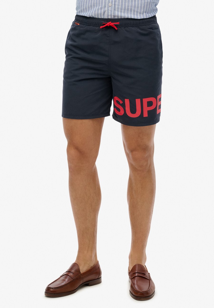 Шорты для плавания Superdry & Co GRAPHIC -INCH, Eclipse Navy/Blue
Шорты для плавания Superdry & Co GRAPHIC -INCH, Eclipse Navy/Blue