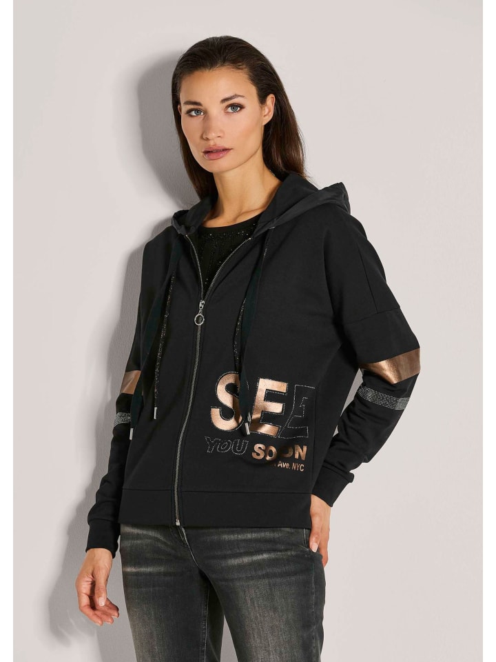 MADELEINE Блестящая куртка свободного кроя, украшенная стразами черного и медного цвета
MADELEINE Блестящая куртка свободного кроя, украшенная стразами черного и медного цвета