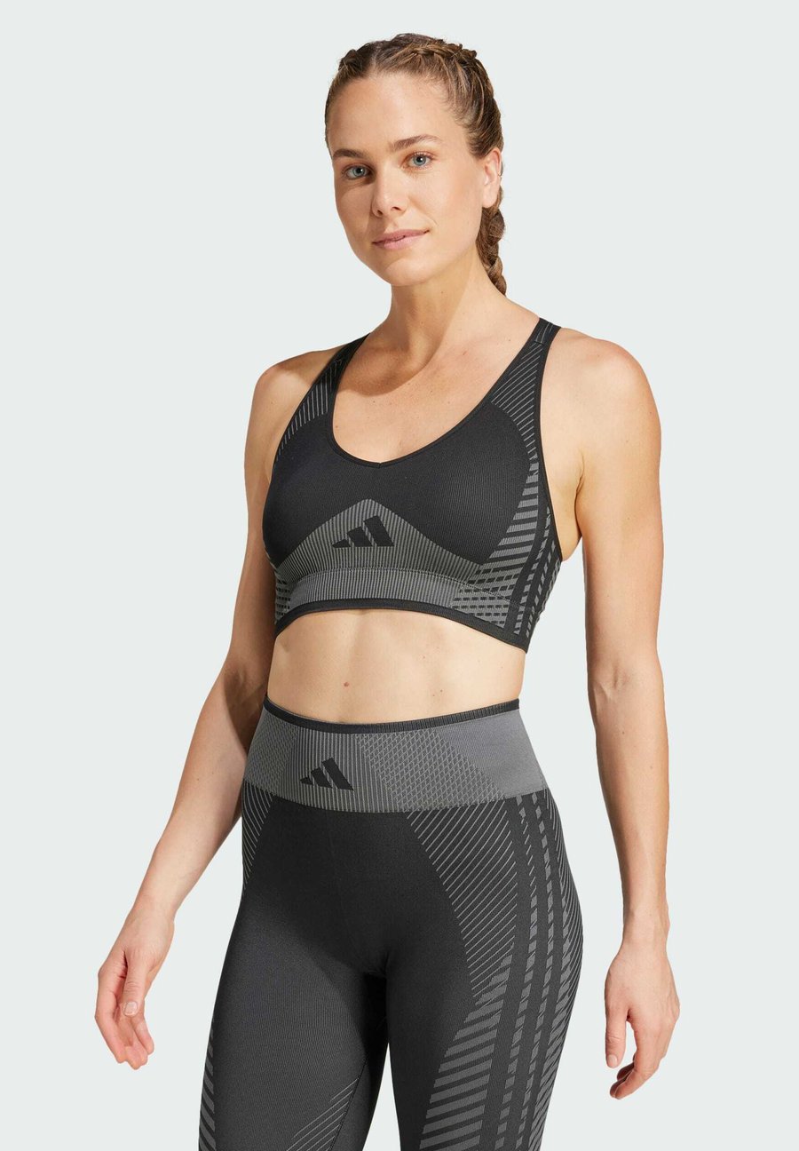 Бюстгальтер Adidas Performance AEROKNIT LIGHT SUPPORT, Black Grey Six/Black
Бюстгальтер Adidas Performance AEROKNIT LIGHT SUPPORT, Black Grey Six/Black