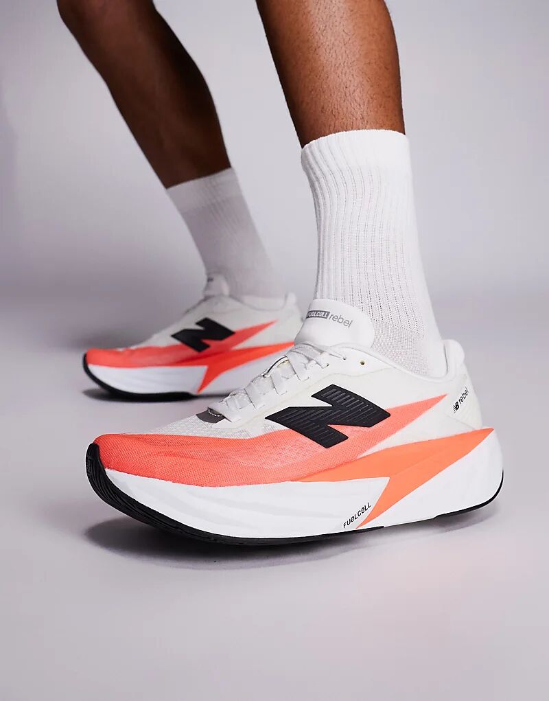 Мужские кроссовки для бега New Balance Fuelcell Rebel v5 ярко-красного и белого цветов
Мужские кроссовки для бега New Balance Fuelcell Rebel v5 ярко-красного и белого цветов